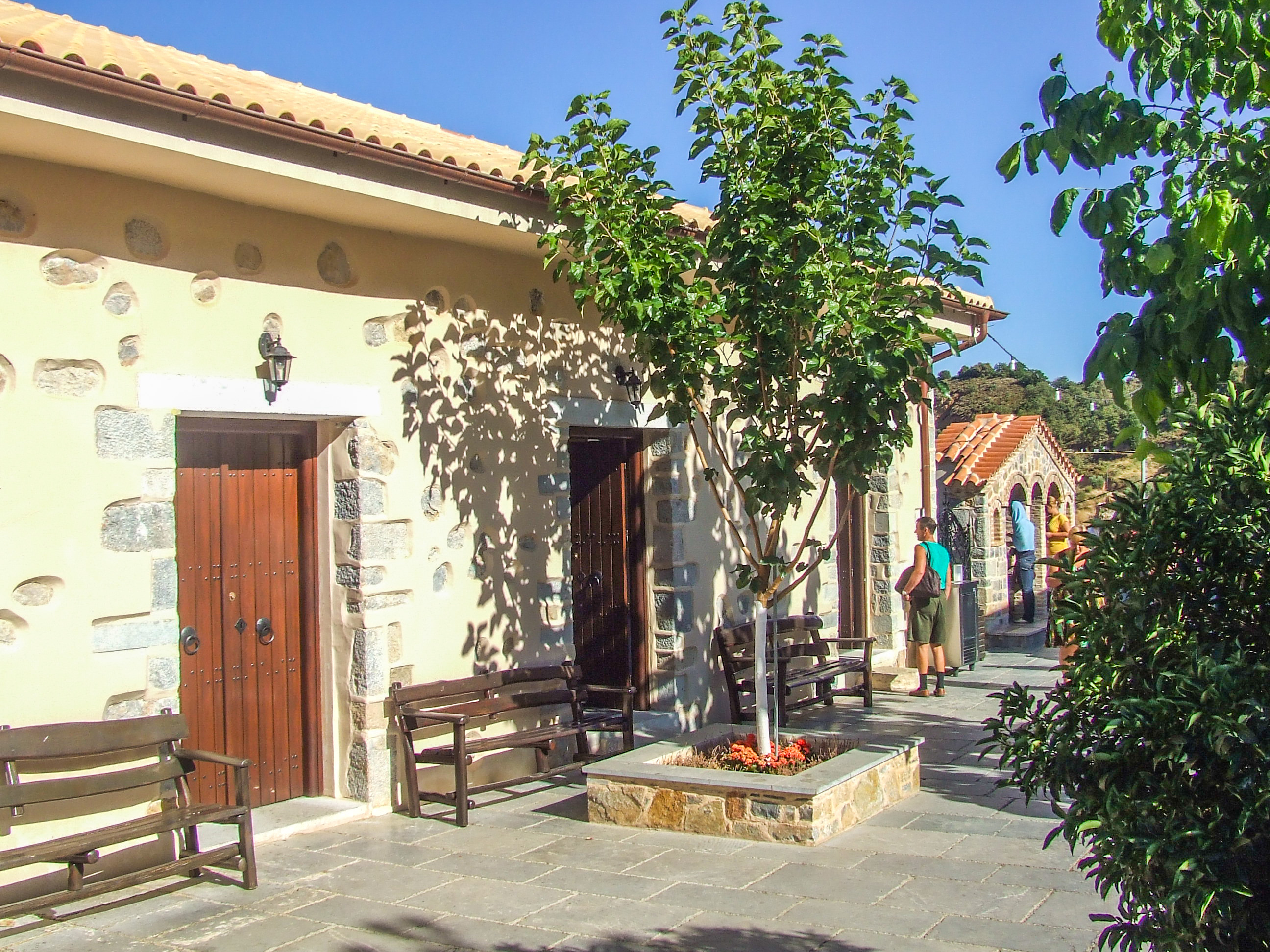 rustic buildings with wooden doors and stone wall